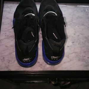 Black and blue nike shoes